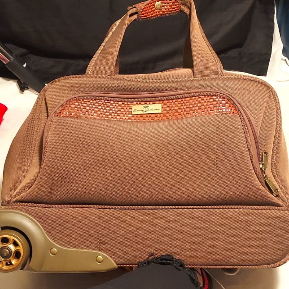 Tommy Bahama wheeled carryon suitcase.